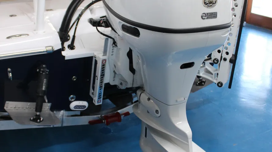 Suzuki outboard engine on a 2025 Action Craft 17 Flyfisher boat, showcasing marine features and design.