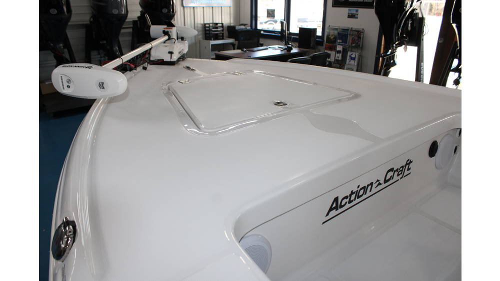 Action Craft 17 Flyfisher boat interior with white deck, storage hatch, and mounted trolling motor, showcasing features for marine enthusiasts at Cape Romain Marine.